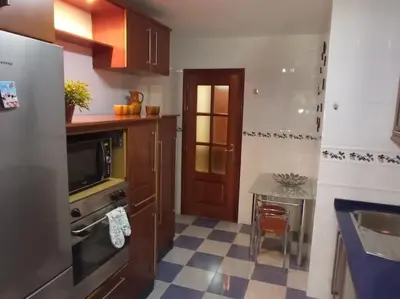 Una cocina o zona de cocina en Piso Auringis