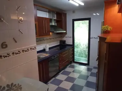 Una cocina o zona de cocina en Piso Auringis