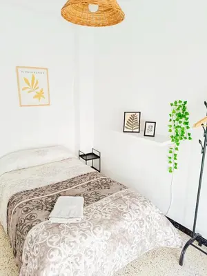 Cama o camas de una habitación en APARTAMENTO COMPLETO con PATIO y TERRAZA - EL CARPIO CENTRO - CORDOBA - WiFi