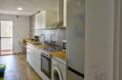 Una cocina o zona de cocina en Unika Homes Palacio de Congresos