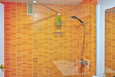 Un baño de Unika Homes Palacio de Congresos