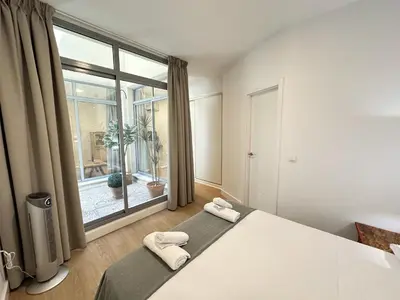 Cama o camas de una habitación en Archeros Suite, Centro de Sevilla