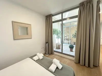 Cama o camas de una habitación en Archeros Suite, Centro de Sevilla