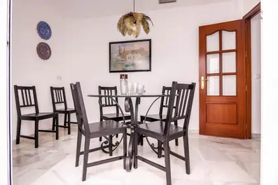 Una televisión o centro de entretenimiento en Casa Del Orfebre