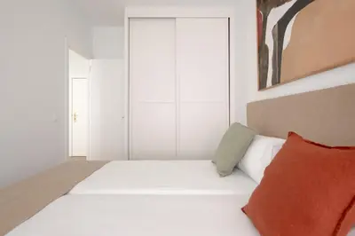 Cama o camas de una habitación en Magno Apartments González Cuadrado