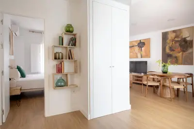 Cama o camas de una habitación en Magno Apartments González Cuadrado