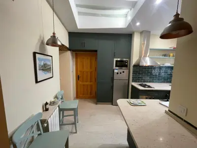 Una cocina o zona de cocina en Entre Tres Campanas