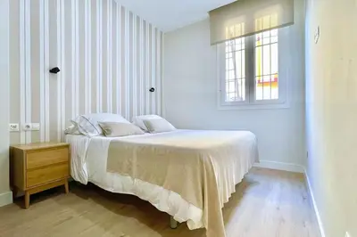 Cama o camas de una habitación en San Marcos Sevilla Center