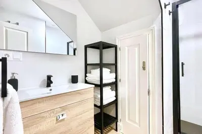 Cama o camas de una habitación en San Marcos Sevilla Center