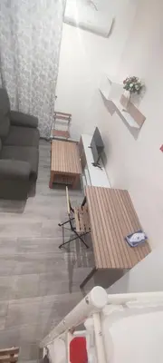 Una televisión o centro de entretenimiento en Apartamentos y lofts De Don Juan