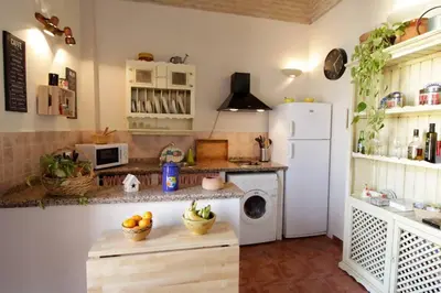Una cocina o zona de cocina en Hosfty Centro - Mirador San Marcos 1