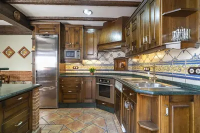 Una cocina o zona de cocina en Casa con patio y terraza en Barrio histórico de la Villa, junto al Adarve