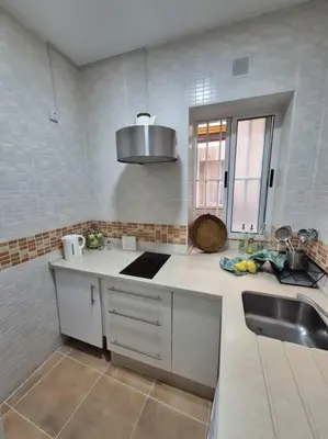Una cocina o zona de cocina en Hostfy Centro, San Román