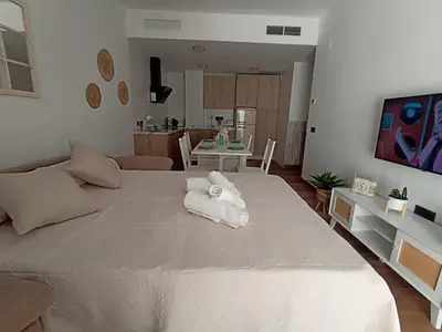 Cama o camas de una habitación en Apartamento nuevo céntrico con Aparcamiento privado Incluido
