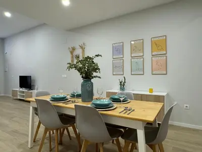 Una televisión o centro de entretenimiento en Apartamento Deluxe Verona