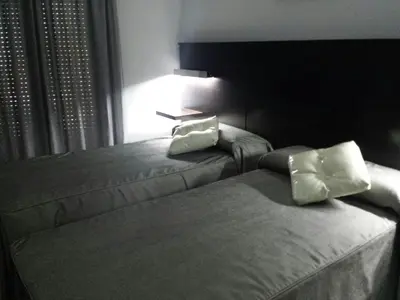 Cama o camas de una habitación en Casa de Larios