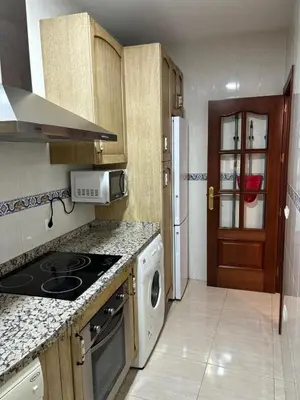 Una cocina o zona de cocina en Sultana Homes