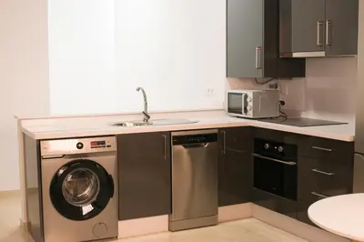 Una cocina o zona de cocina en Apartamentos La Pila del Pato