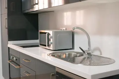 Una cocina o zona de cocina en Apartamentos La Pila del Pato