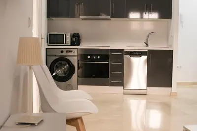 Una cocina o zona de cocina en Apartamentos La Pila del Pato