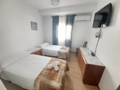 Cama o camas de una habitación en Casa Arcadia Centro de Andalucía