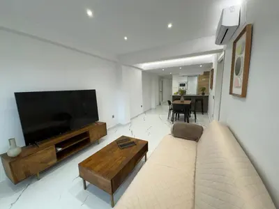 Una televisión o centro de entretenimiento en Boabdil Luxury home