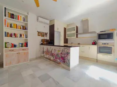 Una cocina o zona de cocina en Santo Rey Suite