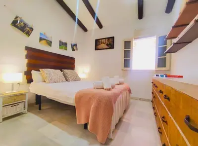 Cama o camas de una habitación en Santo Rey Suite