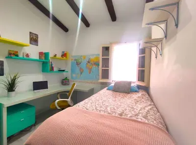 Cama o camas de una habitación en Santo Rey Suite