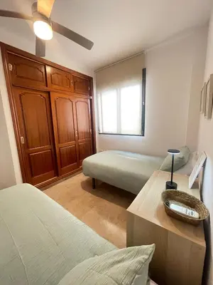 Cama o camas de una habitación en Azahar Centre Apartment & Parking