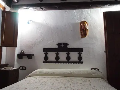 Cama o camas de una habitación en Posá la Cestería