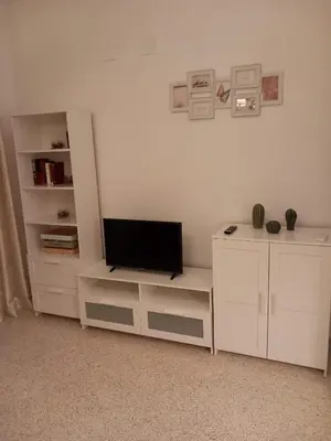 Una televisión o centro de entretenimiento en Apartamentos Lucero de Europa