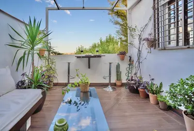 Un balcón o terraza de Ático La Muralla con terraza privada