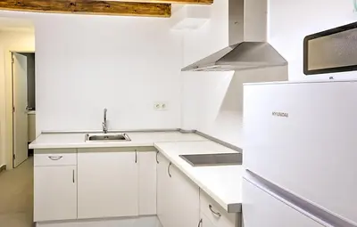 Una cocina o zona de cocina en Luminoso Estudio En el Centro