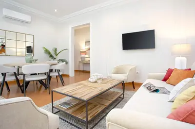 Una televisión o centro de entretenimiento en Genteel Home Manuel de Sandoval