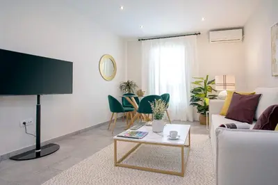 Una televisión o centro de entretenimiento en Genteel Home Santa Marta Cordoba