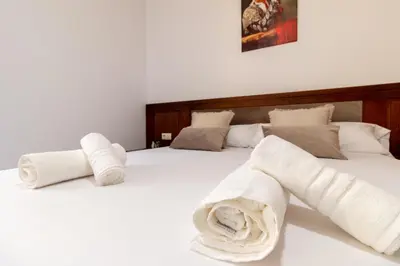 Cama o camas de una habitación en El Toro de María Cristina