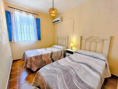 Cama o camas de una habitación en El Oasis de Castil