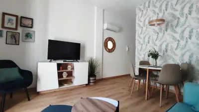 Una televisión o centro de entretenimiento en Casa Yaye Puerta Palma - Écija