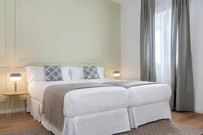 Cama o camas de una habitación en Magno Apartments Tintes