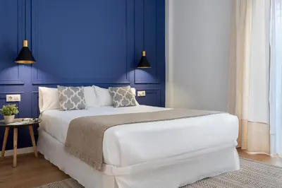 Cama o camas de una habitación en Magno Apartments Tintes