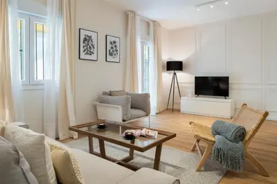 Una televisión o centro de entretenimiento en Magno Apartments Tintes