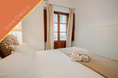 Cama o camas de una habitación en Saber Viajar