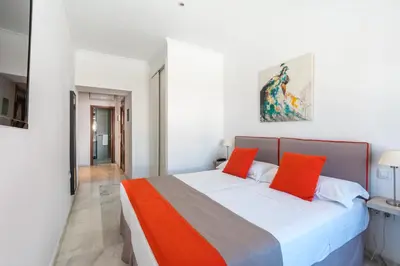 Cama o camas de una habitación en Cool Sevilla Hotel