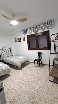 Cama o camas de una habitación en casa rural Ribera del Hueznar