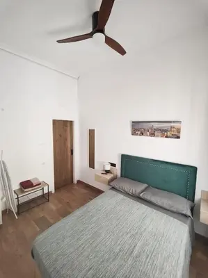 Cama o camas de una habitación en Sevilla Centro con parking