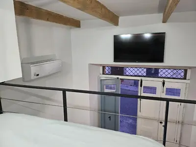 Cama o camas de una habitación en Suite San Fernando