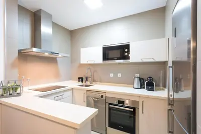 Una cocina o zona de cocina en Atrivm San Julián Apartment
