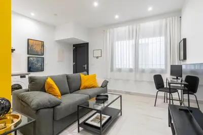 Zona de estar de LP2 Loft Timeless Suite Sevilla en Pareja