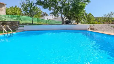 Piscina en o cerca de Cortijo San Rafael Constantina by Ruralidays